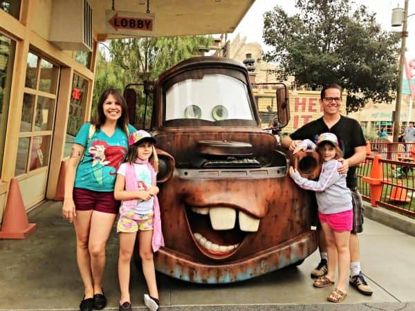 campbell family with Mater at Disneyland middle class dad