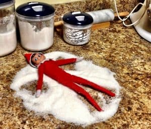 elf on the shelf mischievous ideas Middle Class Dad Elf on the Shelf making a snow angel in sugar