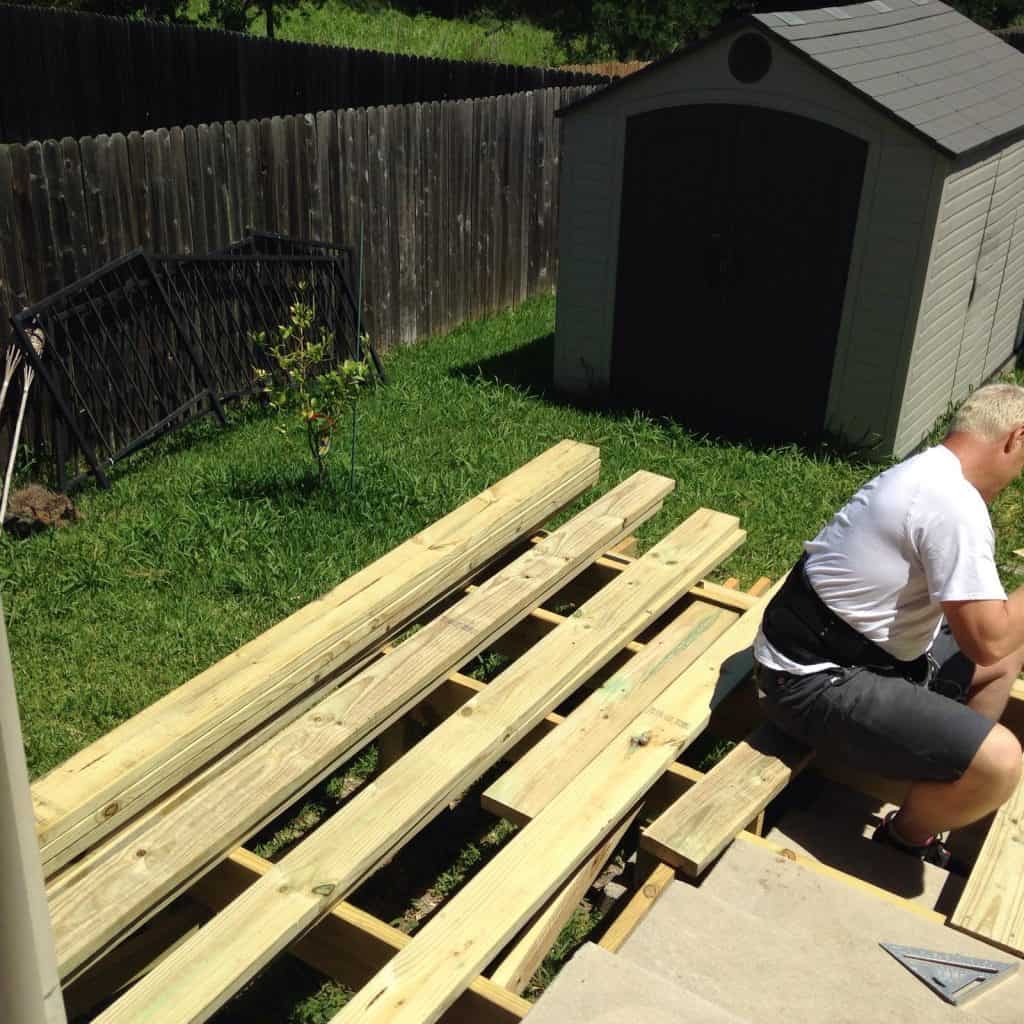 Dave Offield working on deck boards how to build a deck step by step with pictures Middle Class Dad