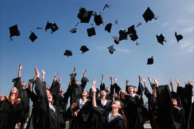 graduates tossing caps in the air Middle Class Dad bio Social Emotional Learning Games