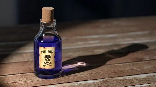 bottle of poison on a wooden table the traits of a negative toxic person Middle Class Dad