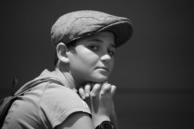 back to school tips for parents Middle Class Dad black and white picture of a sad girl with short hair and a cabbie hat