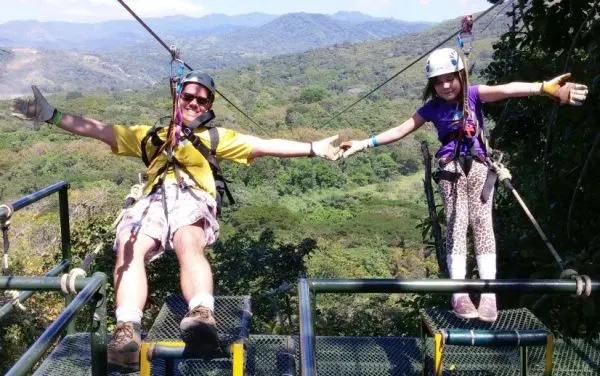 benefits of facing your fears Middle Class Dad Jeff & Jolie Campbell zip lining in Costa Rica