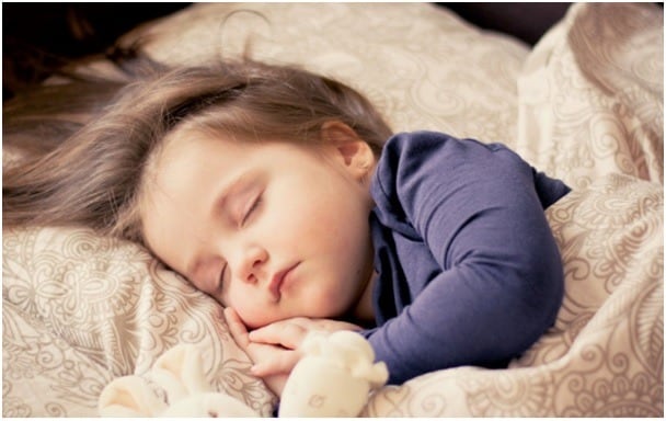 best mattress for kids little girl sleeping middle class dad