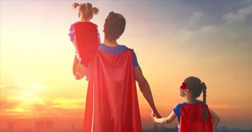 Father and daughters dressed up as superheroes at sunset Father's Day quotes Middle Class Dad