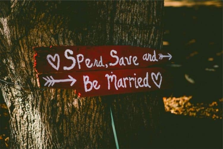 financial marriage counseling spend, save and be married wooden sign on old tree Middle Class Dad